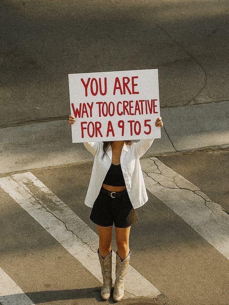Hand-painted sign — "Too creative for a 9 to 5"